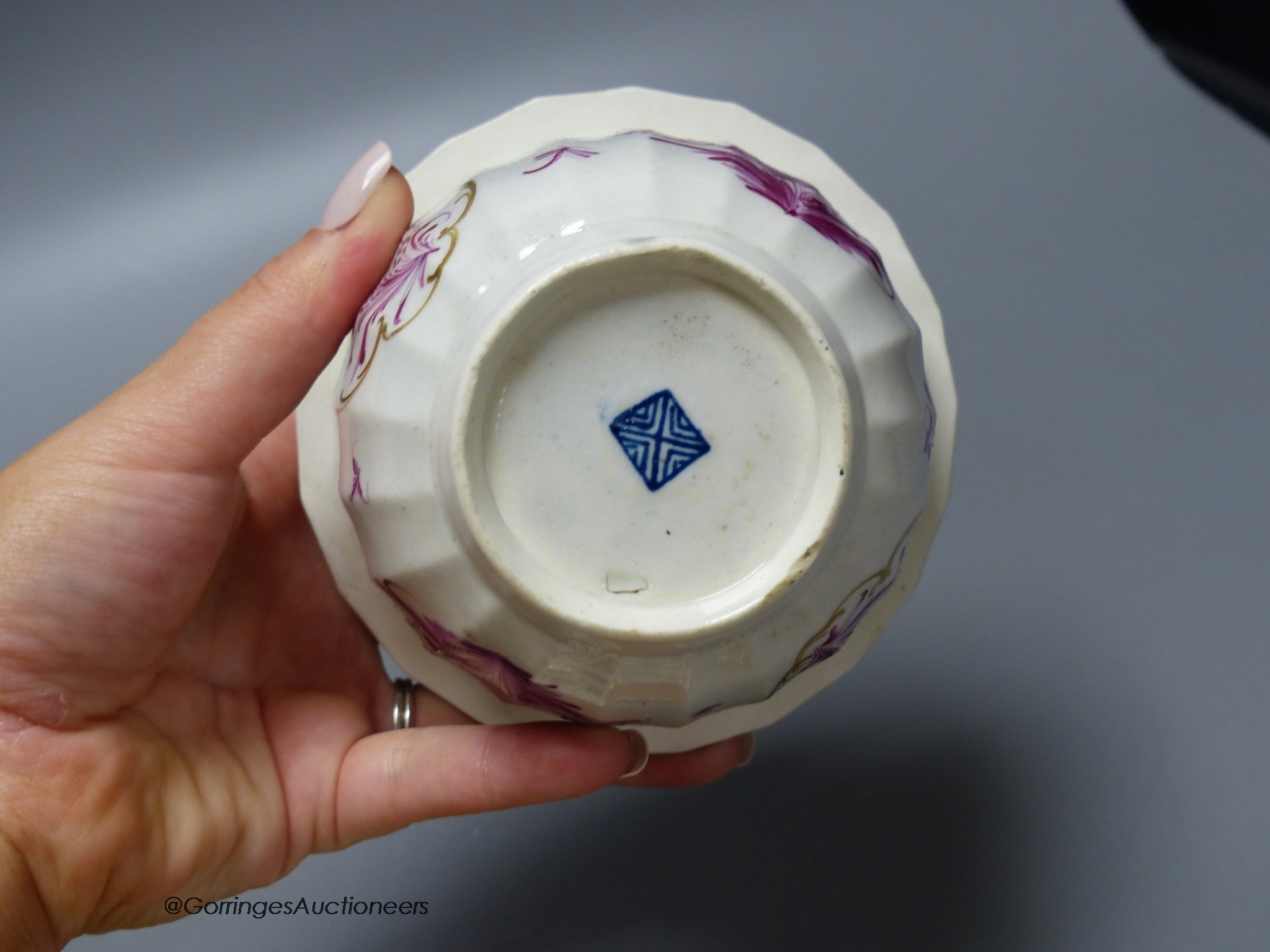 A Worcester plate painted with a very rare Scarlet Japan pattern with blue rock, diameter 20cm, and a Worcester sucrier and cover in a puce Meissen style pattern